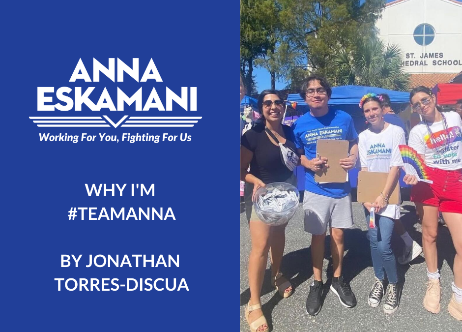 [Image ID: Jonathan, Rep. Eskamani, and other members of Team Anna stand together, smiling and holding clipboards at a pride parade in Orlando]